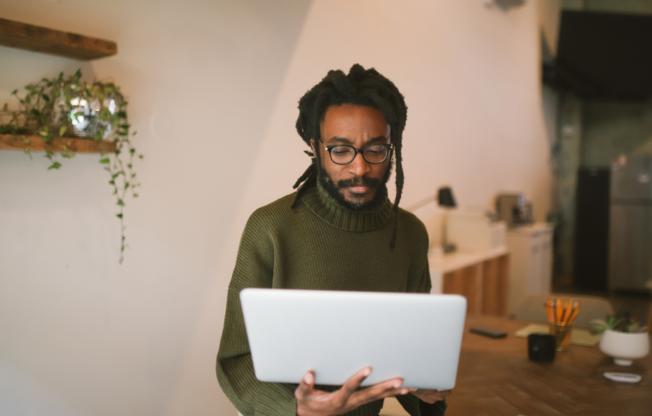 Man holding laptop